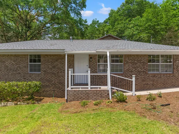 a kitchen with stainless steel appliances granite countertop a refrigerator stove and sink