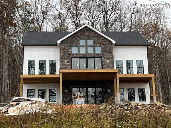 front view of a house with a small yard