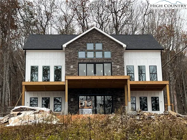 front view of a house with a small yard