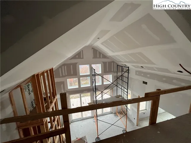 a view of staircase with lots of windows