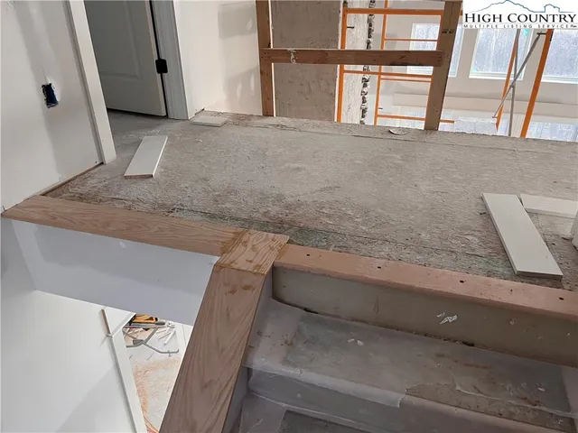 a bathroom with a window sink and tub