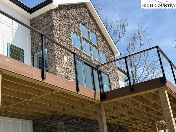 a view of a building with a yard