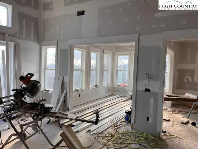 a view of a livingroom with furniture and window