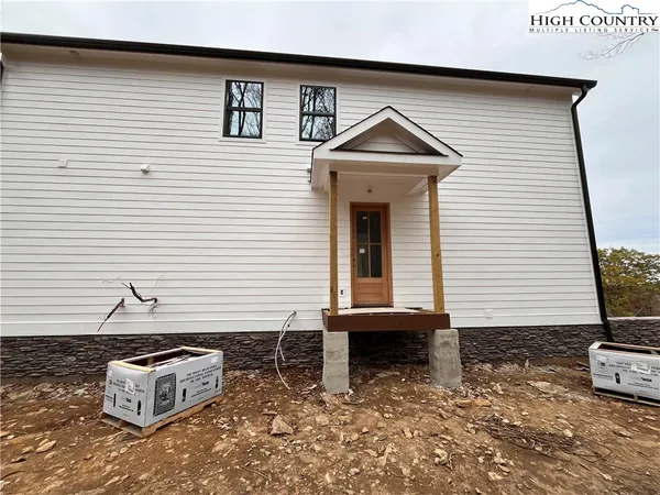a view of a house with a snow