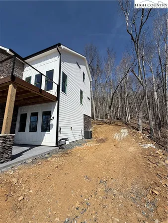 a view of backyard with green space