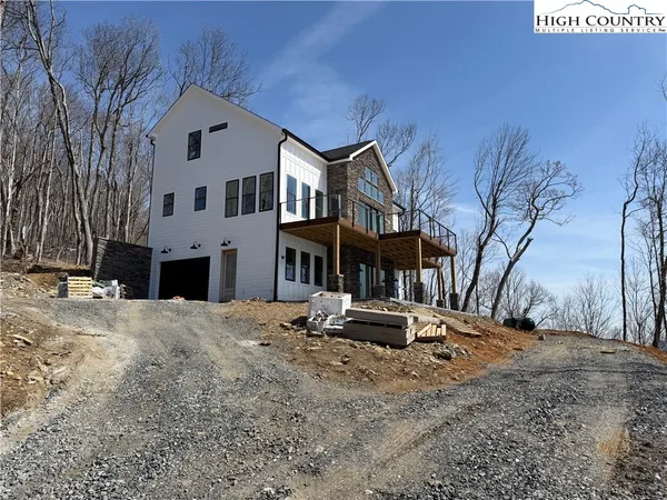 front view of a house with a small yard