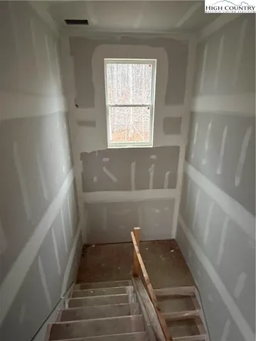 a bathroom with white tub