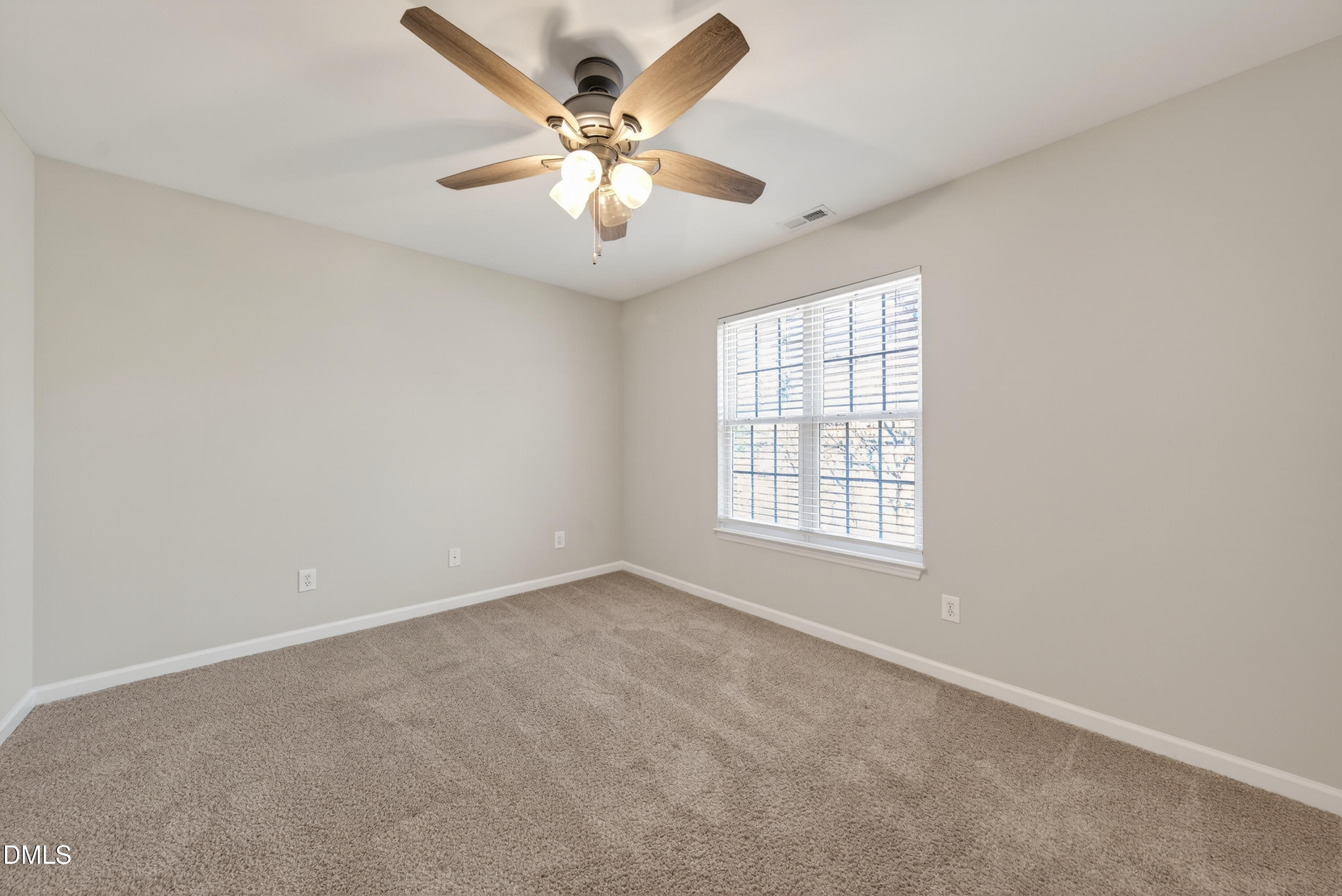 1601 Briarmont Court Raleigh, NC 27610 - Photo 23 of 30 an empty room with a window