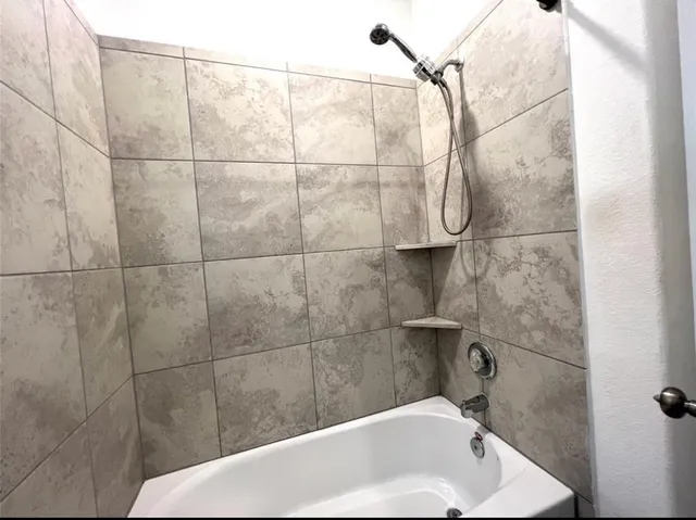 a bathroom with a bathtub