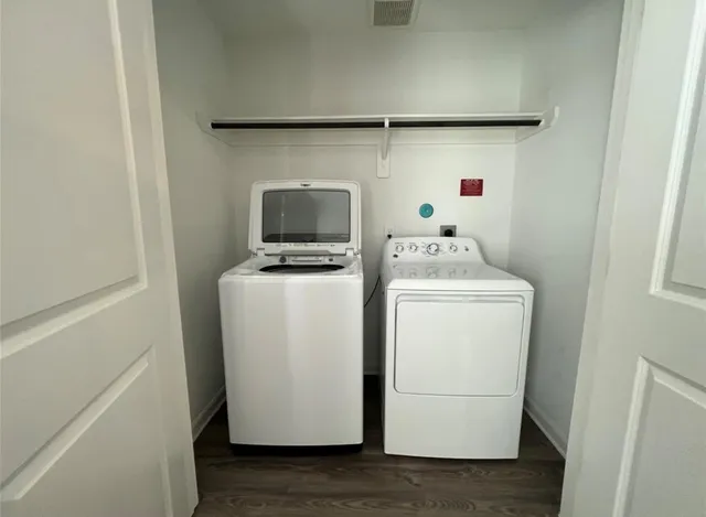 a utility room with dryer and washer