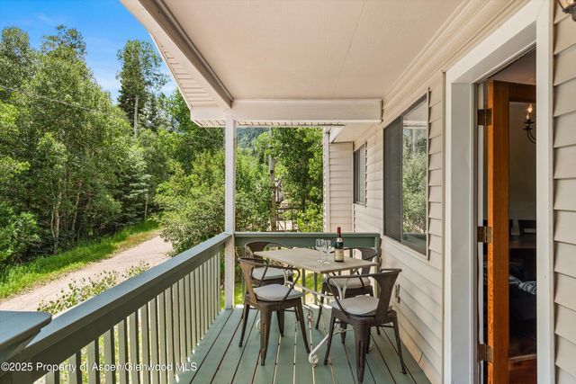 a view of balcony patio and outdoor seating