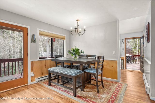 a view of a chair and table in the yard