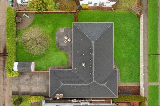 an aerial view of a house with a garden