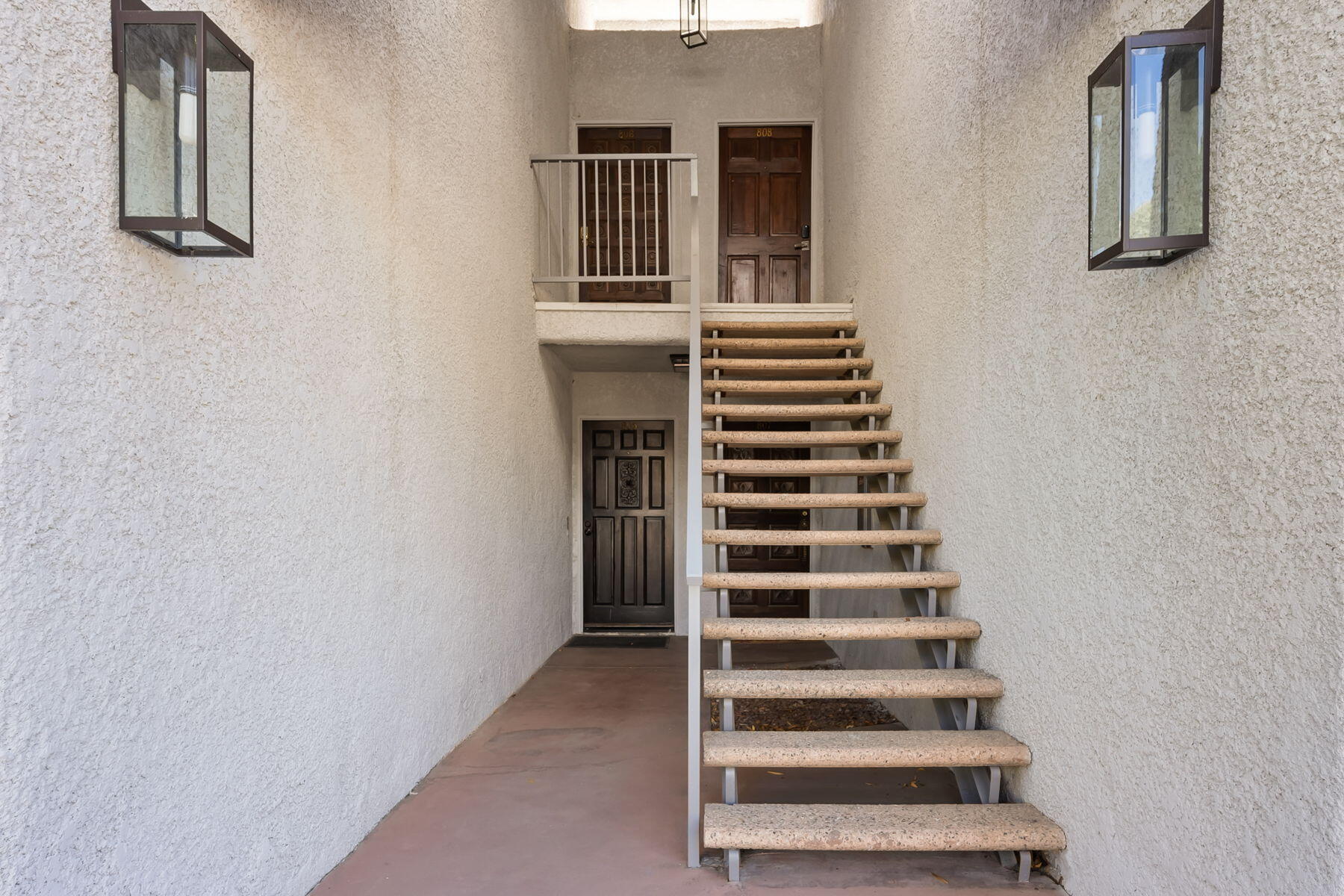 3155 Ramon Road, Unit 808 Palm Springs, CA 92264 - Photo 32 of 37 a view of a room with stairs and windows