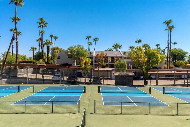 3155 Ramon Road, Unit 808 Palm Springs, CA 92264 - Photo 35 of 37 a swimming pool with outdoor seating