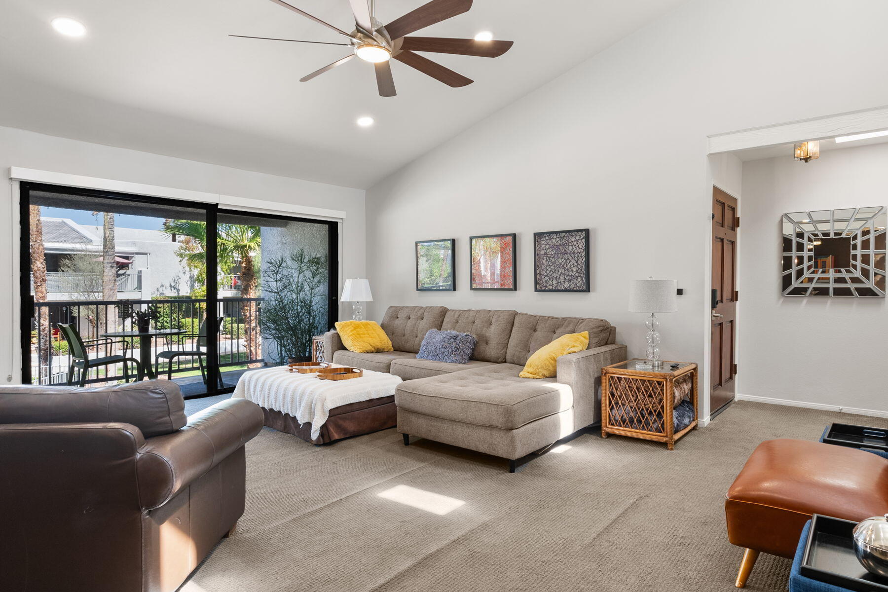 3155 Ramon Road, Unit 808 Palm Springs, CA 92264 - Photo 6 of 37 a bedroom with furniture and large windows