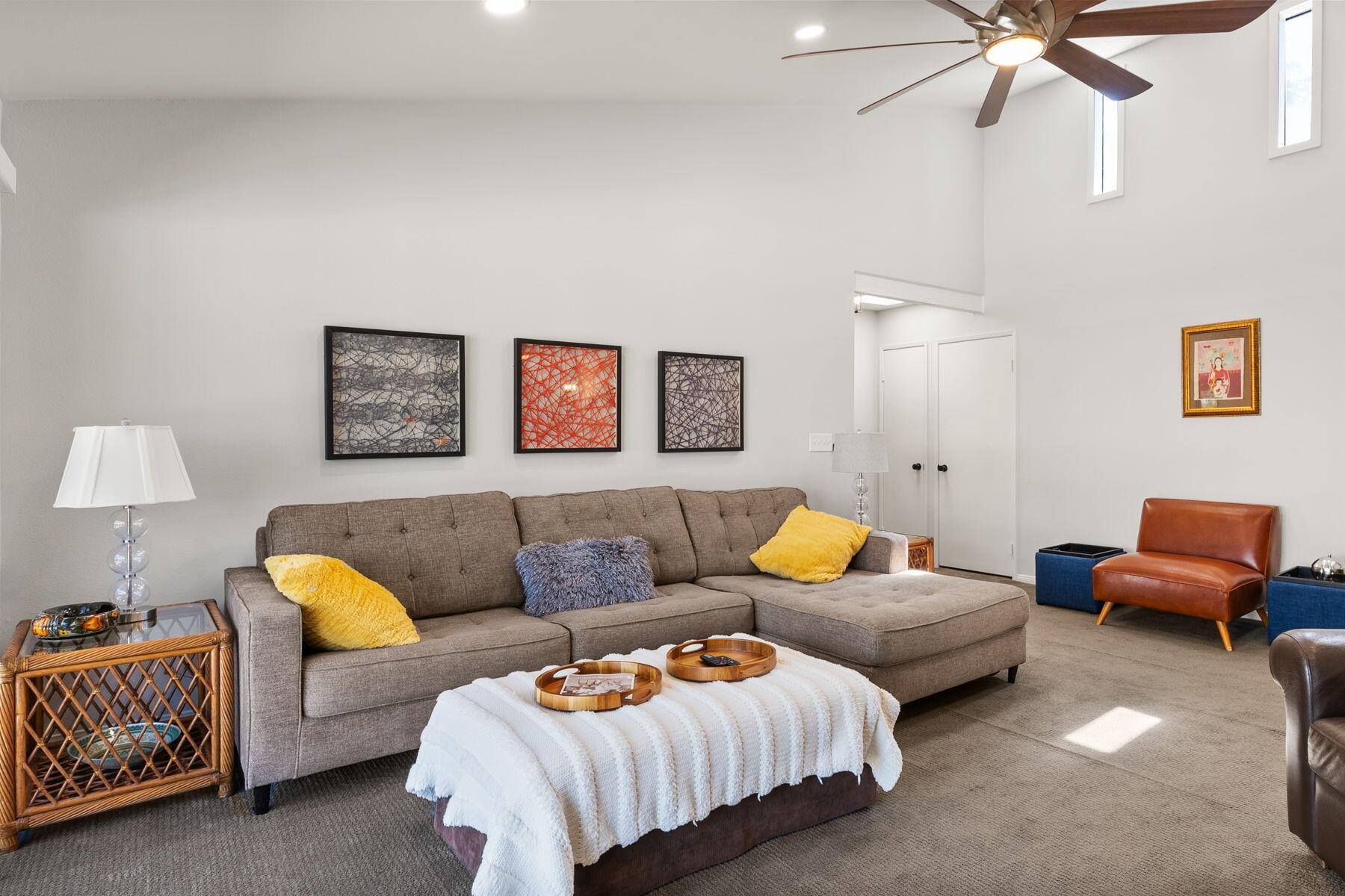 3155 Ramon Road, Unit 808 Palm Springs, CA 92264 - Photo 7 of 37 a living room with furniture and a lamp