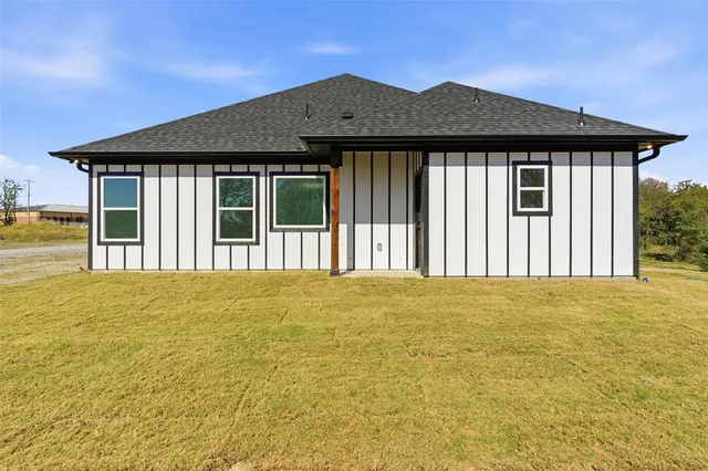 a view of a house with a ocean view