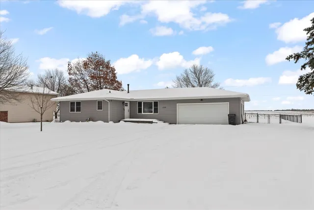 a view of a city street with a building