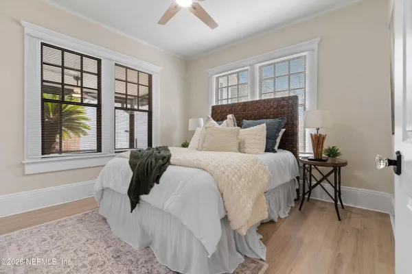 a view of a house with a yard porch and sitting area