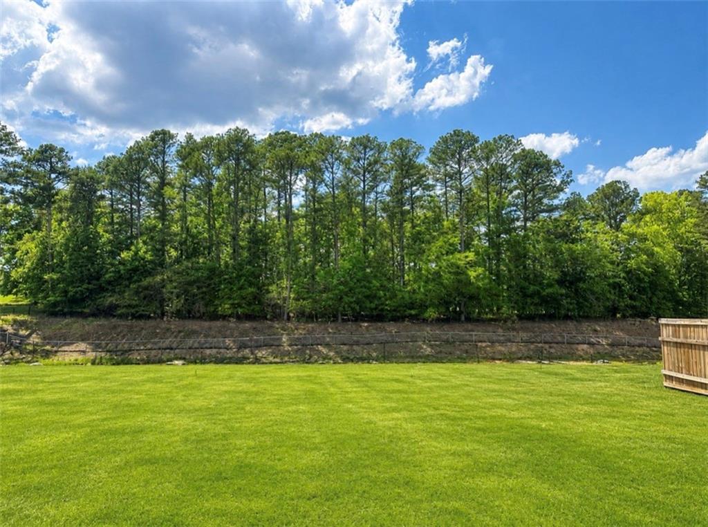 53 Bennett Way Rome, GA 30161 - Photo 24 of 42 a view of a swimming pool with an outdoor space and seating area