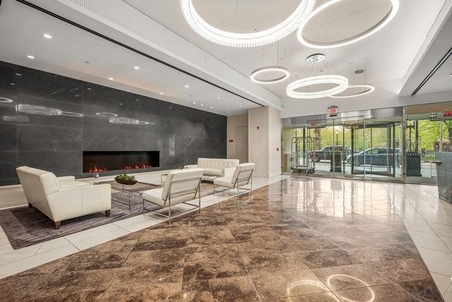 a large room with lots of table and chairs