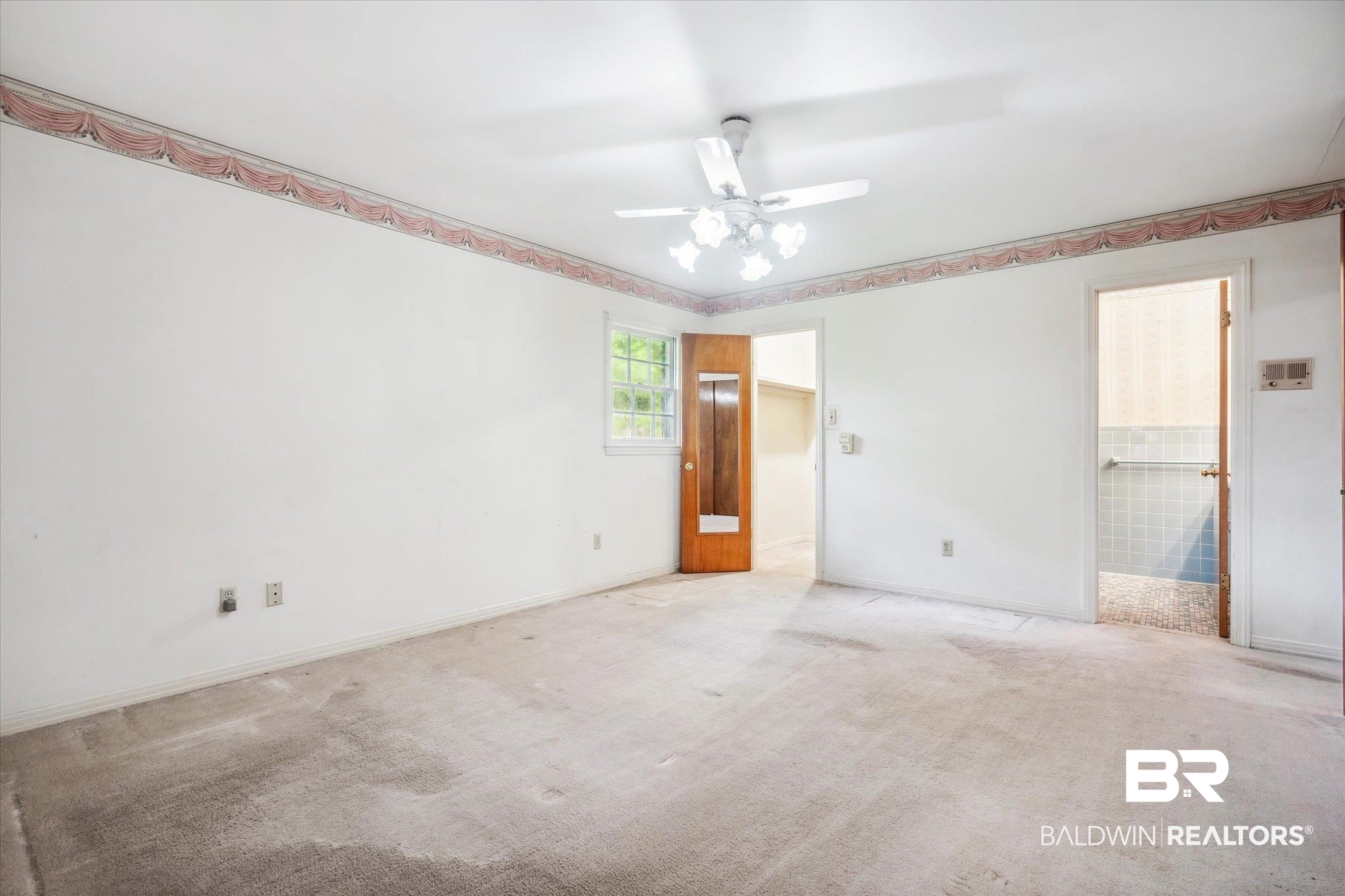 1252 Helm Circle Mobile, AL 36693 - Photo 11 of 18 Unfurnished bedroom with light colored carpet and ceiling fan