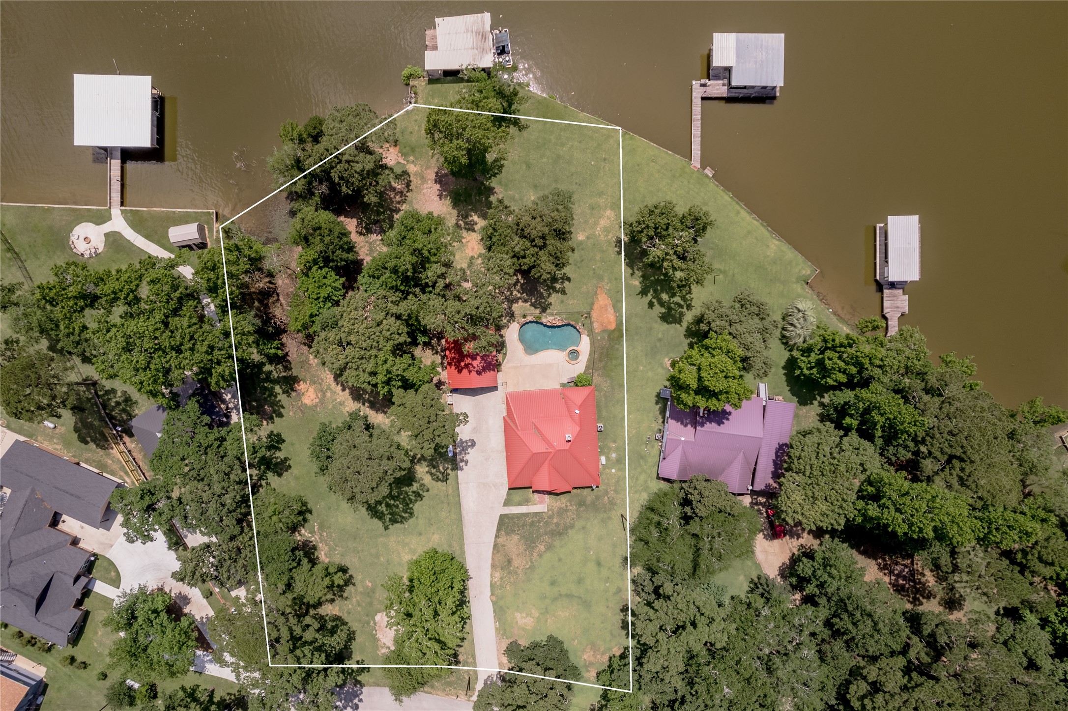 324 Red Oak Lane Trinity, TX 75862 - Photo 4 of 49 an aerial view of a house with a yard