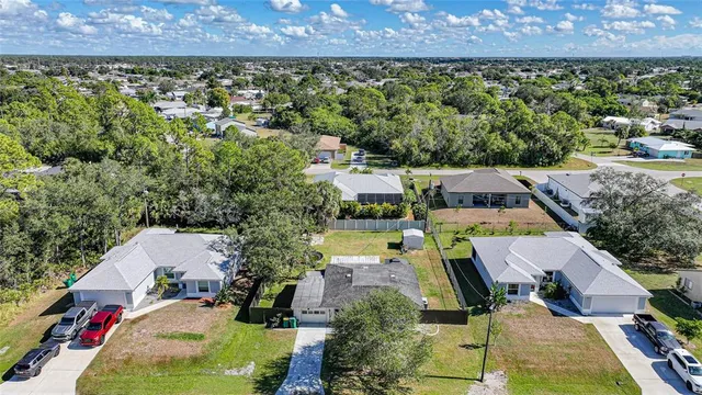 an aerial view of a house with a garden