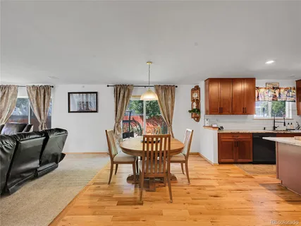 a view of a dining room with furniture