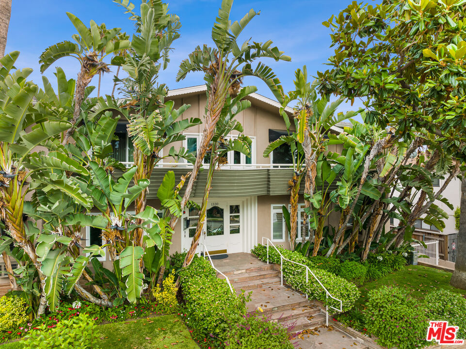 1330 North Crescent Heights Boulevard, Unit 16 West Hollywood, CA 90046 - Photo 23 of 25 front view of a house with a small yard