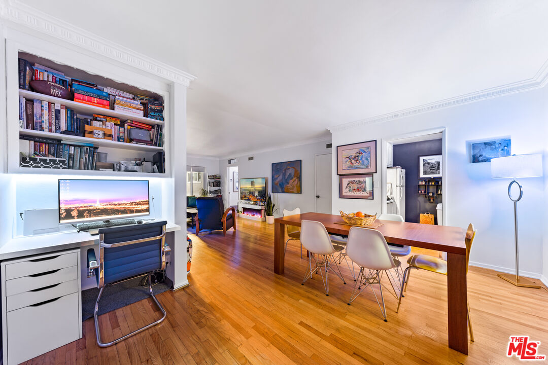 1330 North Crescent Heights Boulevard, Unit 16 West Hollywood, CA 90046 - Photo 6 of 25 a living room with furniture and a flat screen tv