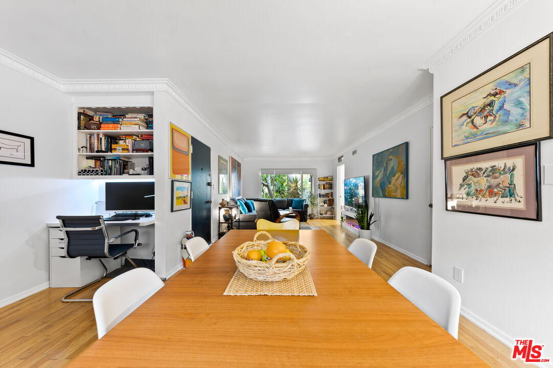 1330 North Crescent Heights Boulevard, Unit 16 West Hollywood, CA 90046 - Photo 7 of 25 a living room with furniture and a flat screen tv