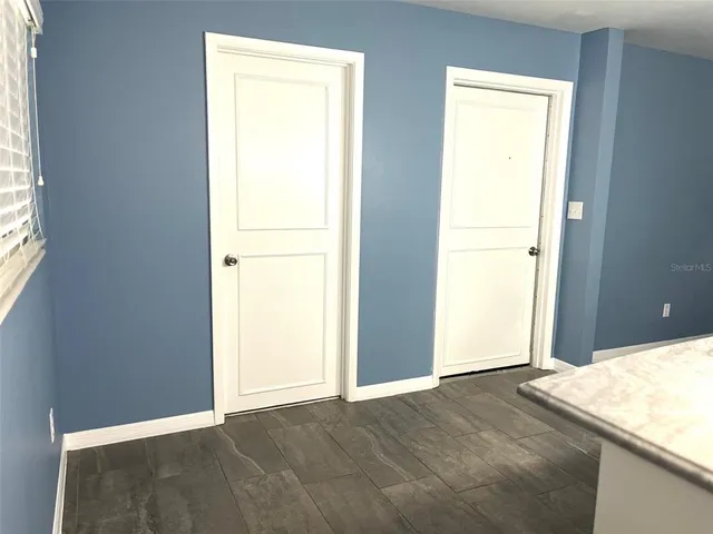 an empty room with window