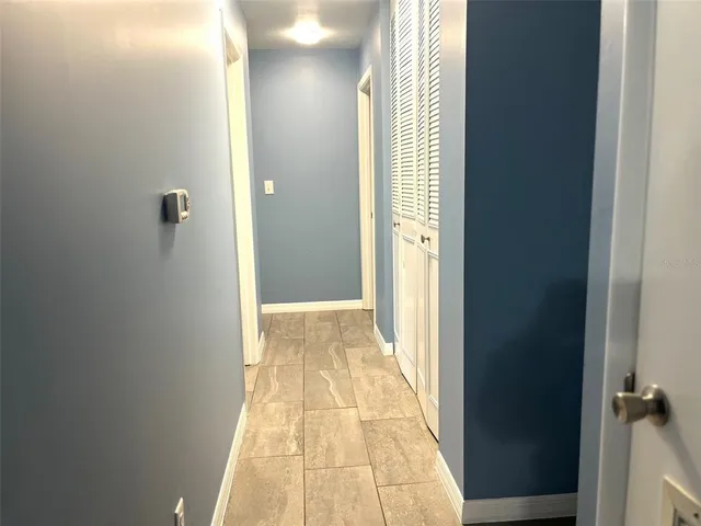 a view of a bathroom from a hallway