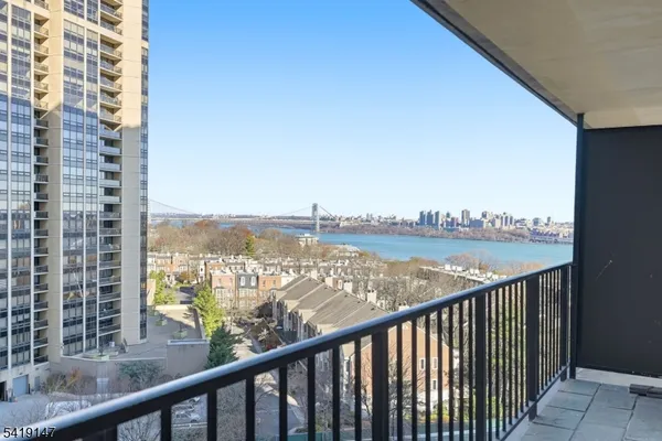 a view of a balcony with city view
