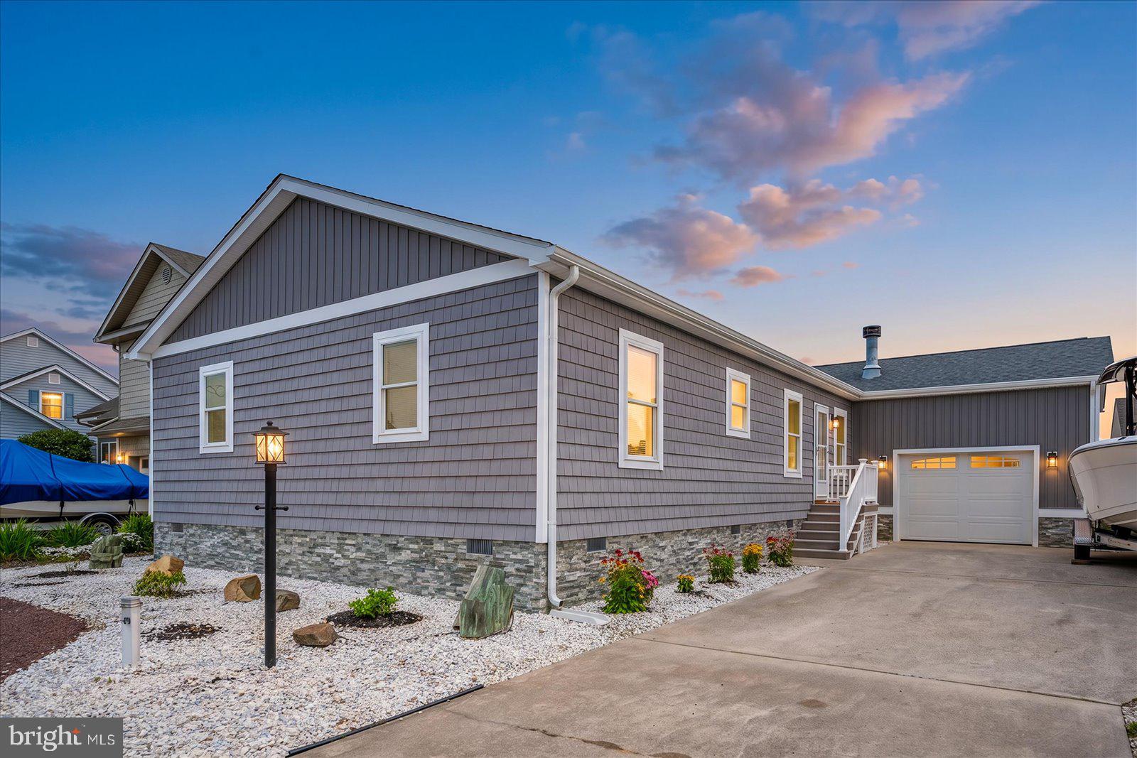 10362 Keyser Point Road Ocean City, MD 21842 - Photo 1 of 51 Charming home with serene sunset glow.