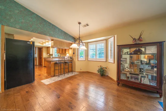 a view of kitchen with furniture and window