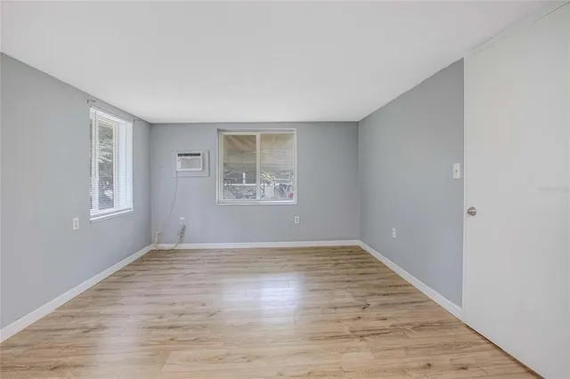 an empty room with windows