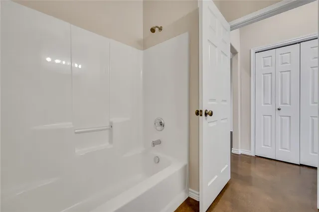 a bathroom with a bathtub