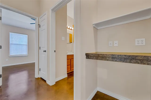 a view of an entryway with front door