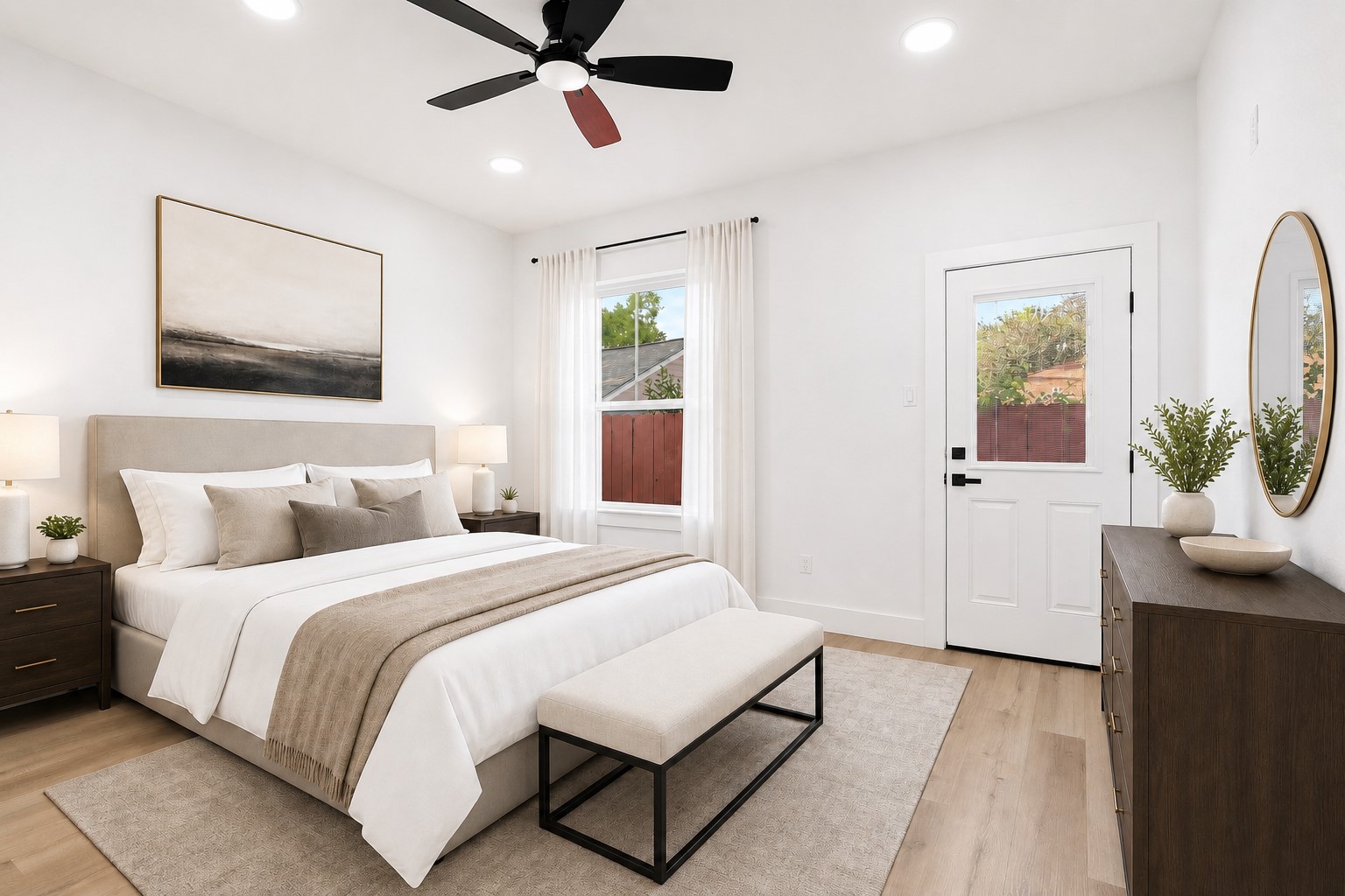 4606 Mallow Street, Unit A Houston, TX 77051 - Photo 13 of 21 a bedroom with a large bed and a chandelier