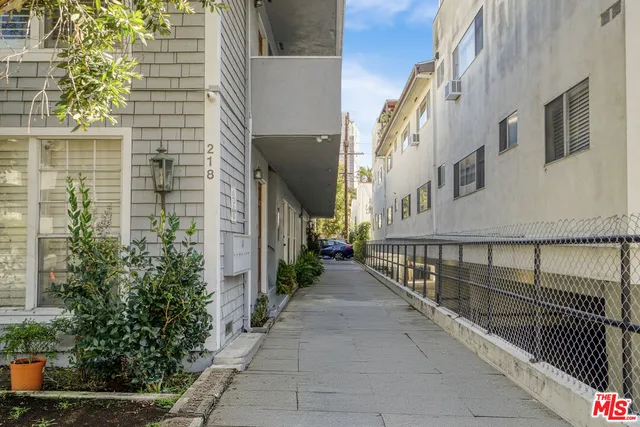 a view of a pathway along with brick buildings