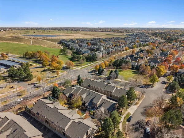 an aerial view of ocean with residential house and lake view