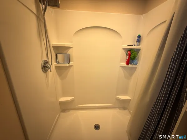 a en suite bathroom with a shower