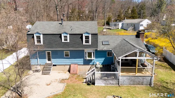 aerial view of a house with swimming pool