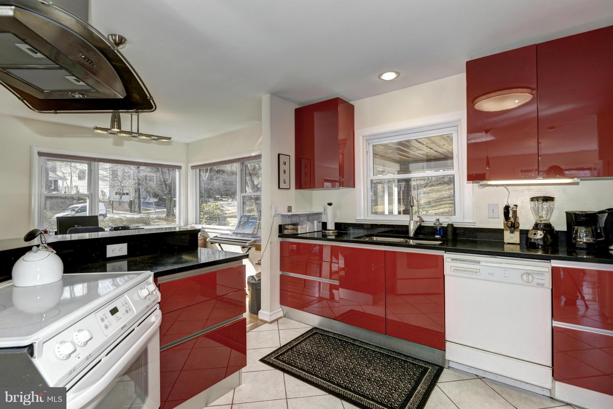 9307 Compton Street Silver Spring, MD 20901 - Photo 5 of 28 Kitchen: red cabinets, "star gazer" granite!
