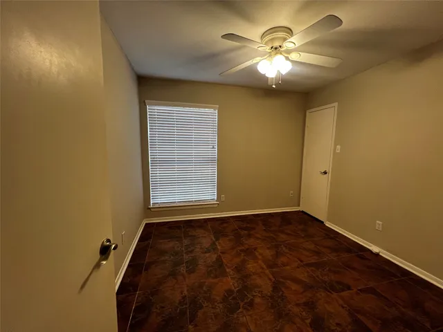 a view of entryway and hall with a window