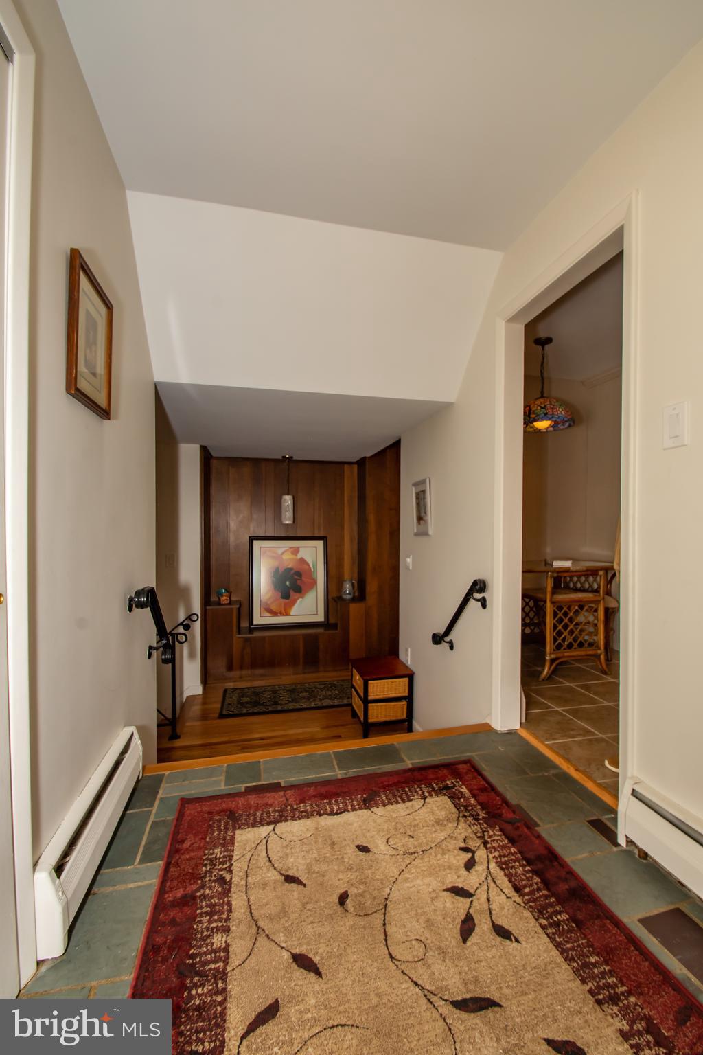 249 Orchard Road Paoli, PA 19301 - Photo 10 of 29 Slate foyer to solid hardwoods