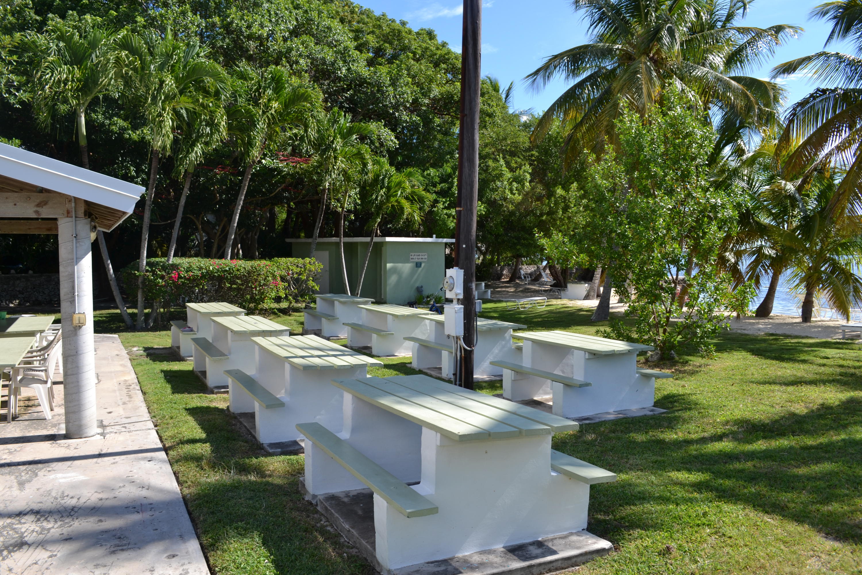 39 Bass Avenue Key Largo, FL 33037 - Photo 25 of 25 a view of a house with backyard sitting area and garden